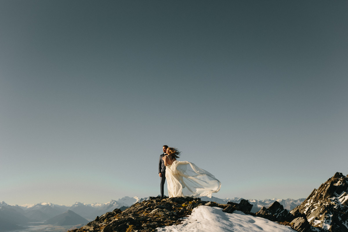 Bride and groom at their mountain elopement in Glenorchy on Mount Creighton by Dawn Thomson Photography