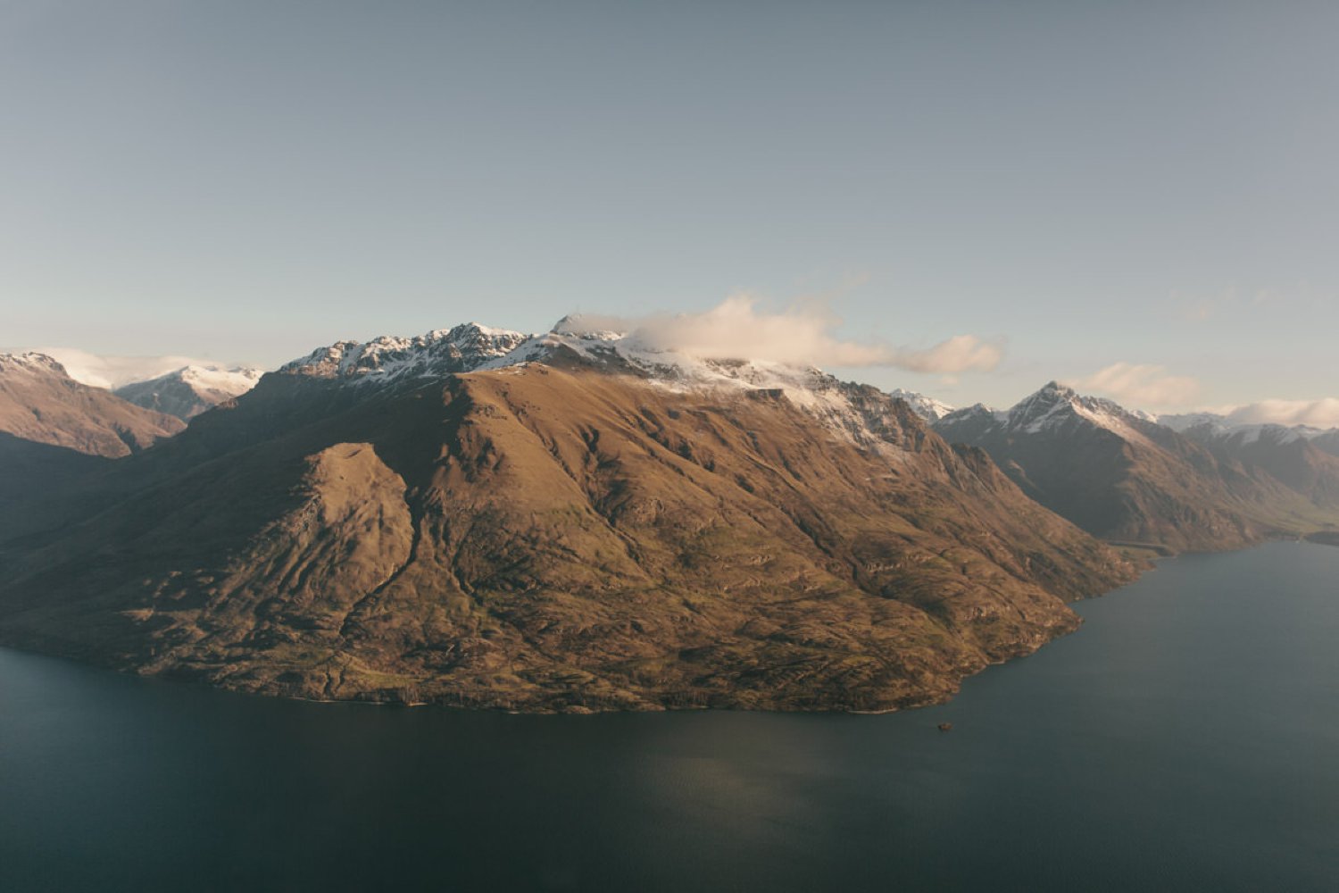 Beautiful views of Lake Wakatipu and Cecil Peak Ledge at Queenstown Winter Helicopter Elopement