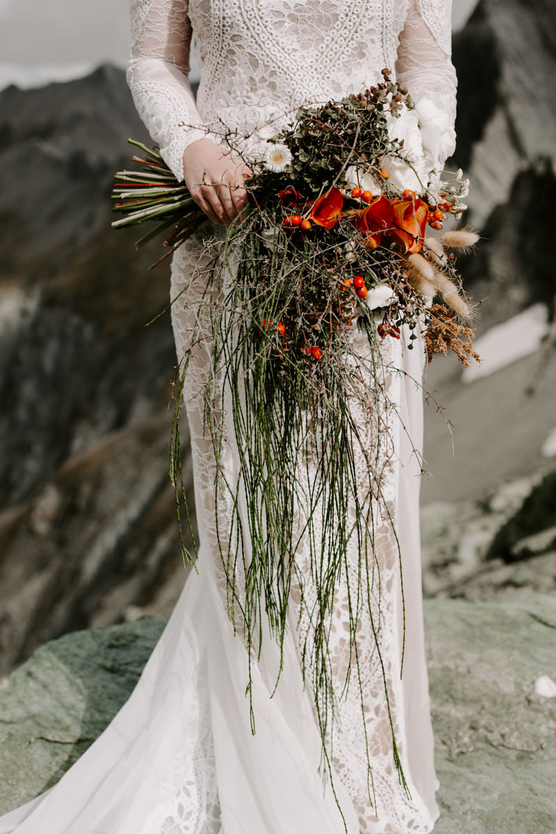 Wild New Zealand flowers in Indie vibe elopement wedding by The Lovers Elopement Co