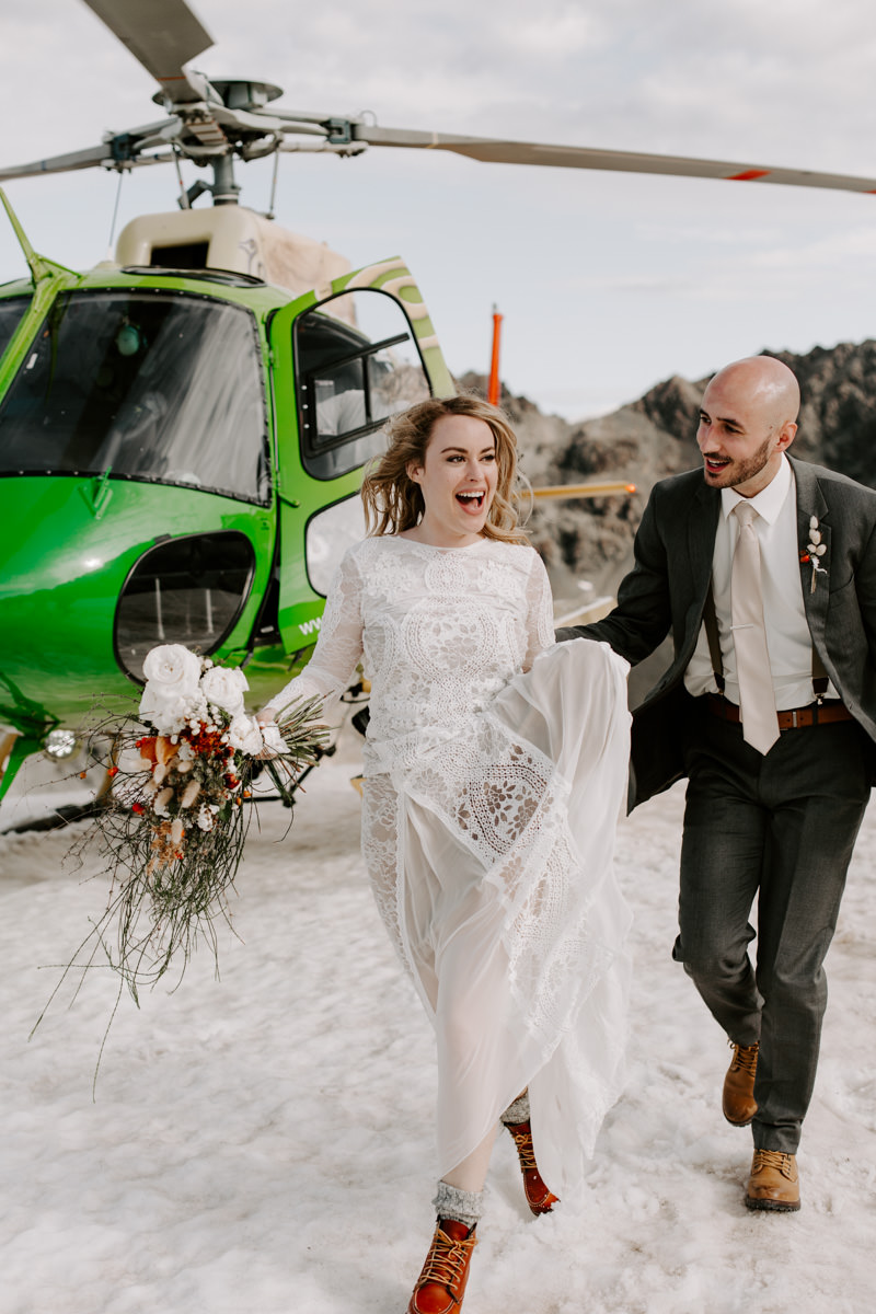 Bride wearing Grace Loves Lace dress at new Zealand Elopement wedding by The Lovers Elopement Co at New Zealand wedding